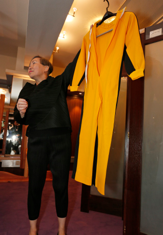 Illustration for article titled Got $40,000? Buy Bruce Lee's Shrunken Yellow Jump Suit